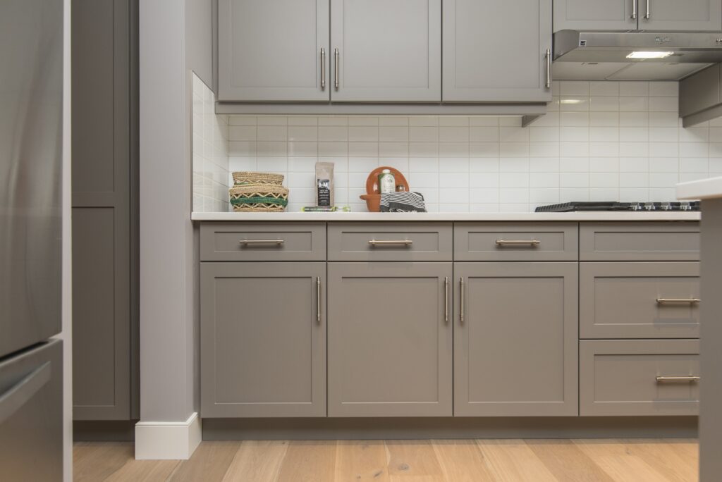 A beautiful shot of a modern house kitchen shelves and drawers